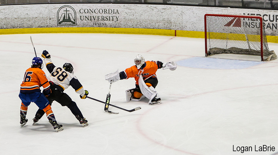 students playing ice hockey